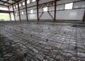 Этапы сооружения промышленных полов для складских помещений от подготовки основания до финишного слоя